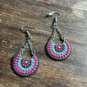 Silver dangle earrings with light blue and pink beads
